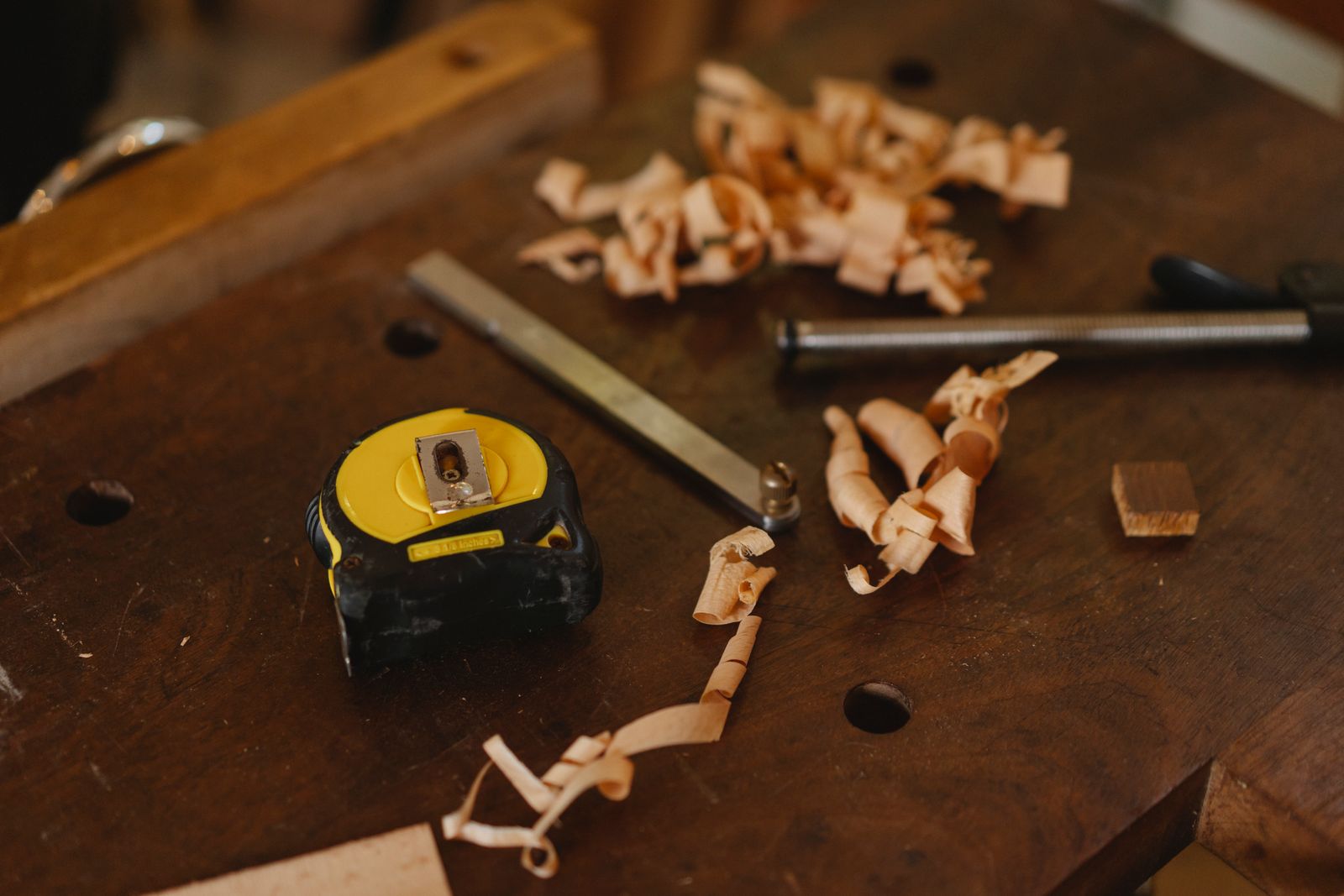 A cabinetmaker fitting a drawer front in the Hearth and Grain workshop